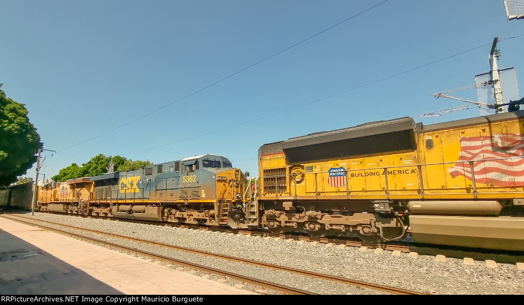 CSX ES40DC Locomotive leading a train